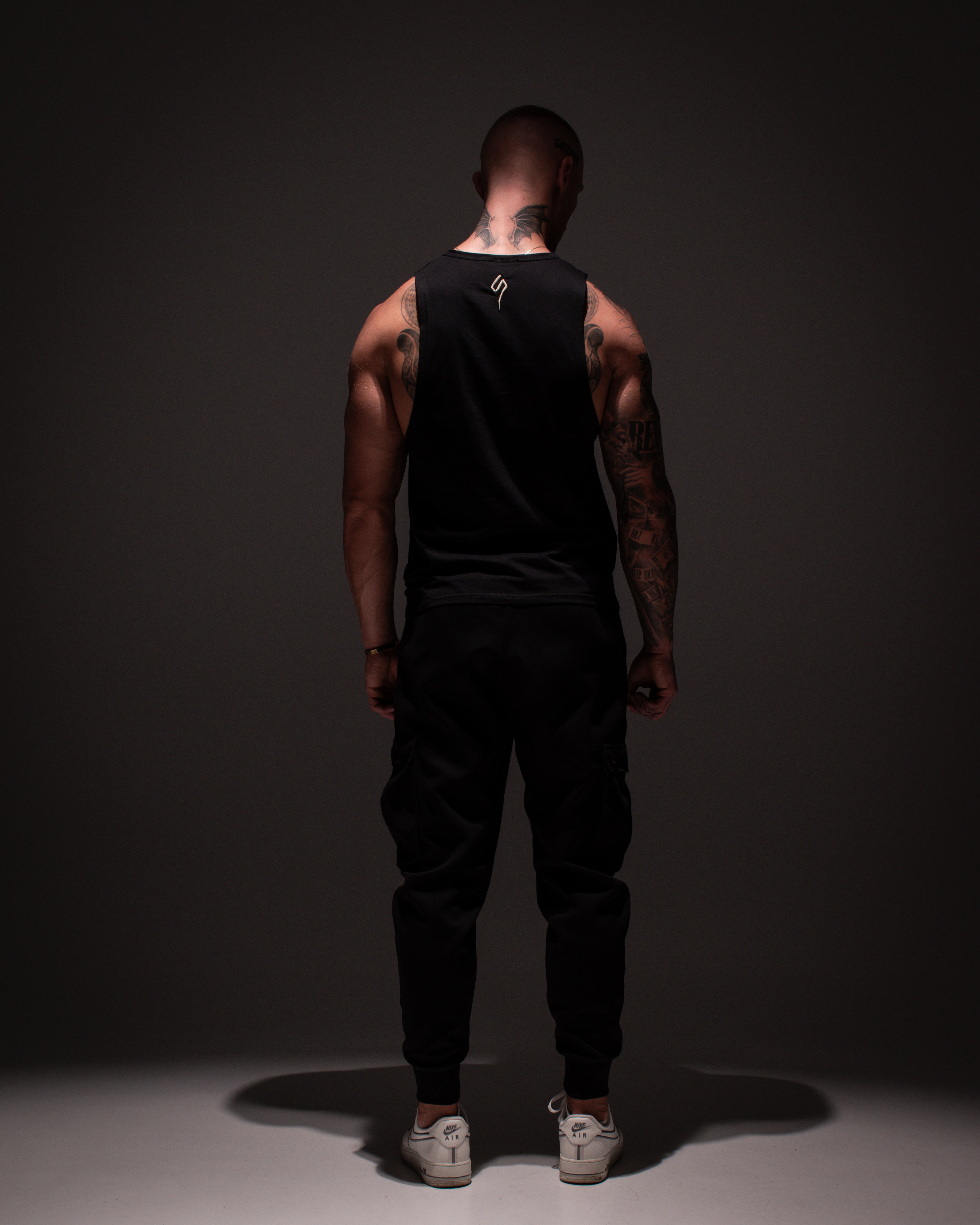 Cinematic photo of model with a Sigma tank top